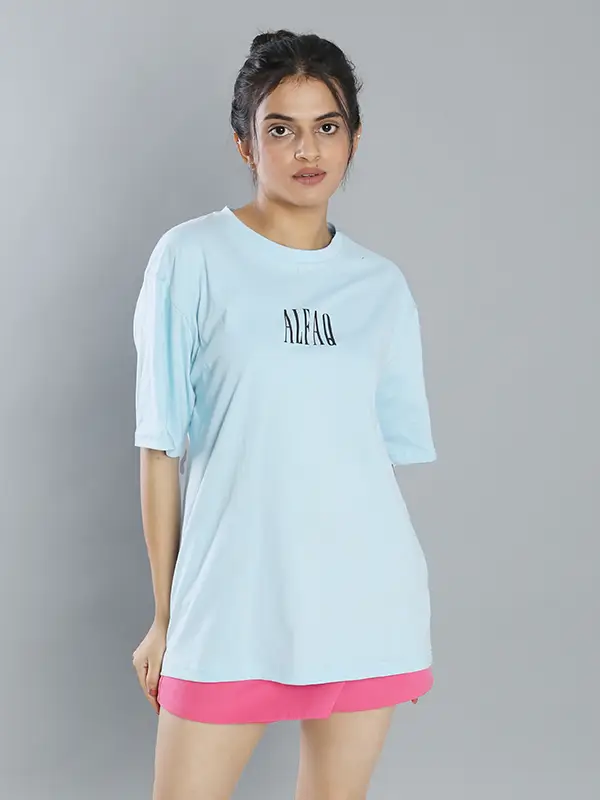 Vibrant sky blue oversized tee with printed design