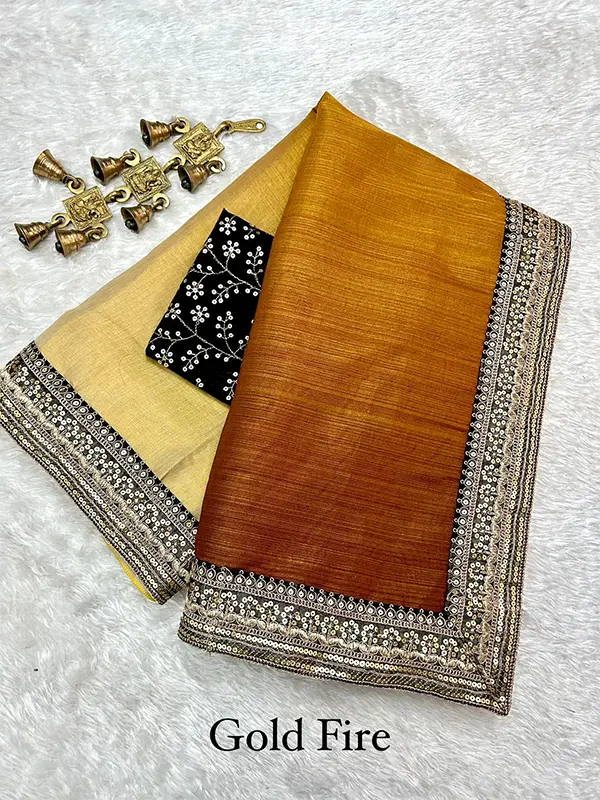 Elegant Premium Tussar Silk Saree with heavy sequins border and Bangalori Silk blouse.