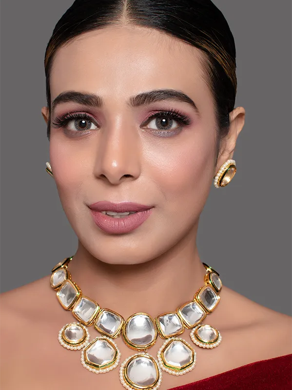 gold tone necklace and earrings