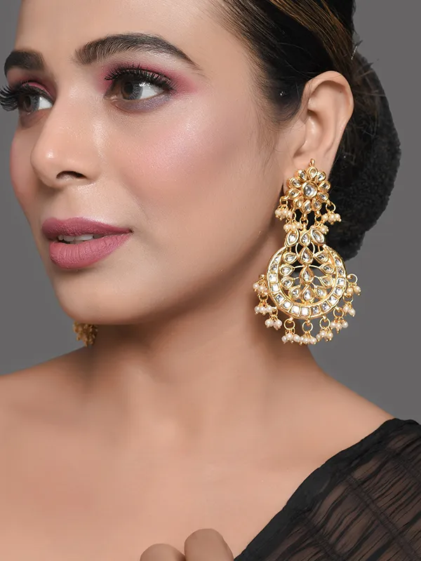 Gold toned Kundan Crescent Shaped earring